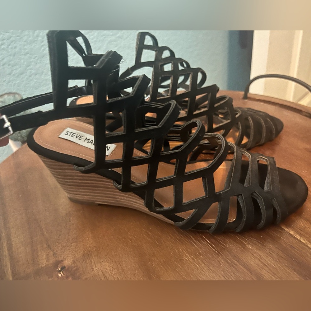 Women’s strappy black wedge sandals